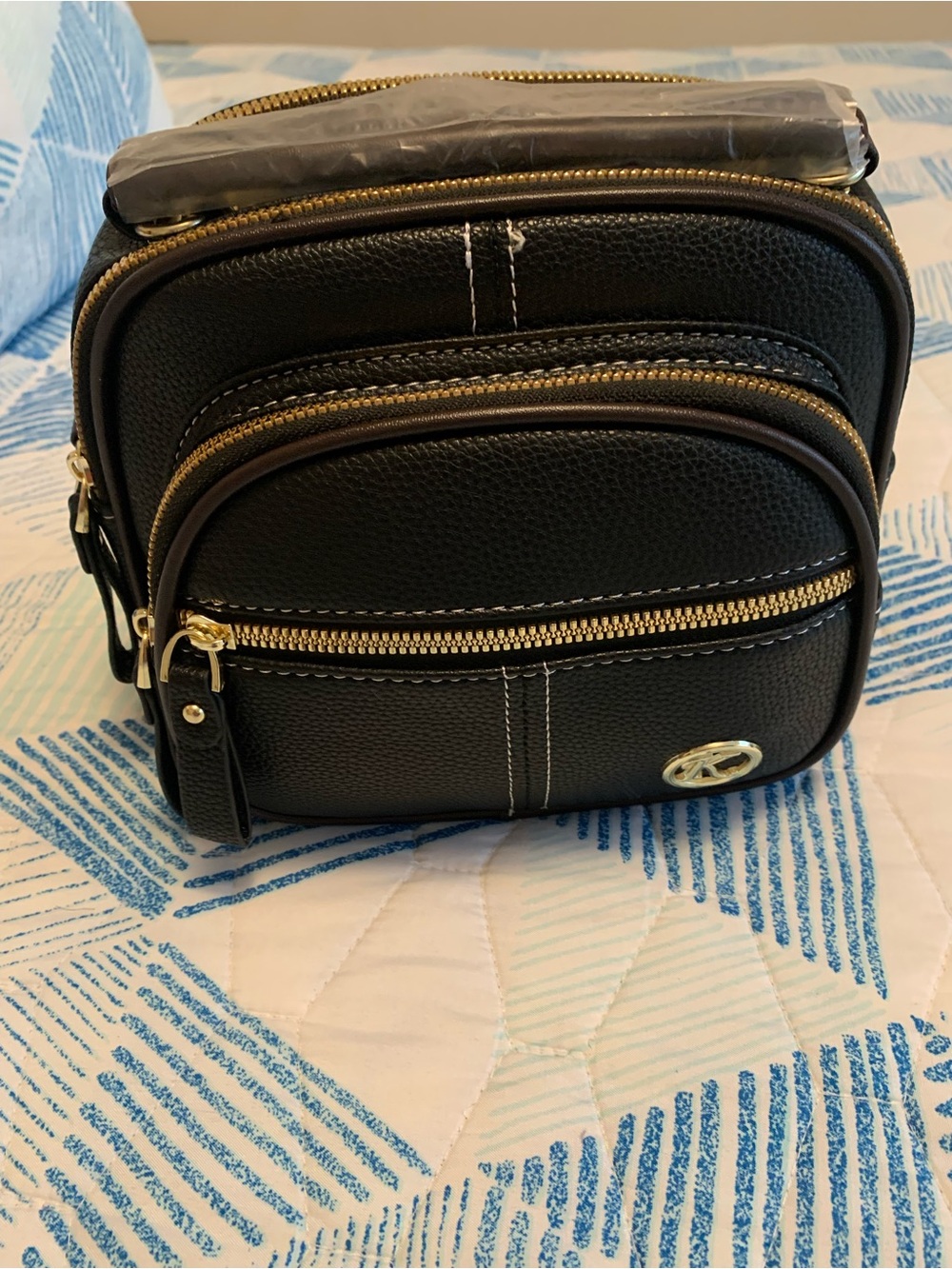 Compact Black Mini Crossbody Bag with Gold Hardware